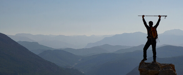 person on top of the mountain