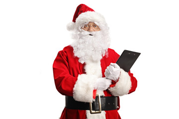 Surprised Santa Claus holding a clipboard and looking at camera