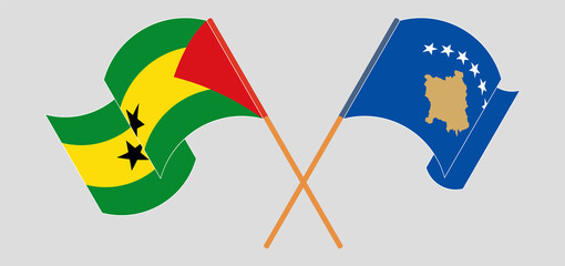 Crossed and waving flags of Sao Tome and Principe and Kosovo