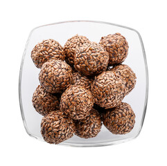Bowl with tasty flax seed candies on white background