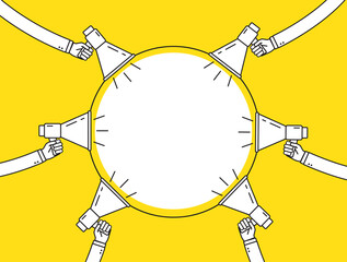 Hands holding megaphones around the banner.