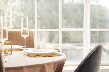Beautiful table setting for wedding celebration in restaurant