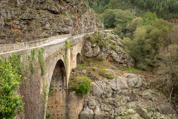 Fototapeta na wymiar Alvarenga bridge (aka Canelas bridge) over Paiva river, Municipality of Arouca, Aveiro District, Portugal