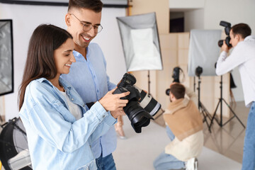 Young photographers during classes in studio