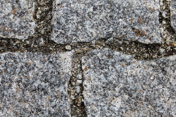 Square stone floor, parallel close-up