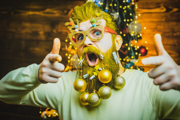 Funny santa pointing finger on you. Christmas and New Year holidays. Crazy fun face.