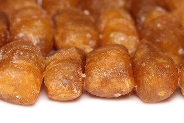 Close up shot of South Indian sweets called Khaja on white plate