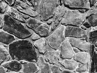 black white ancient castle fortress stone rock wall barrier close view vintage historic architectural background