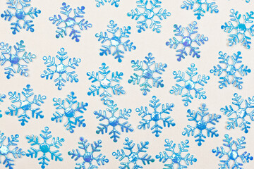 Blue snowflakes on a white background. Use as background or texture