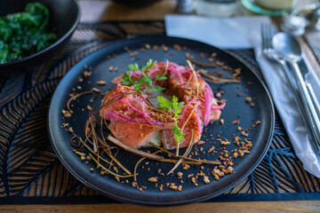 delicious salmon tataki seafood appetizer at restaurant