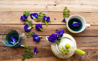 herbal drinks hot butterfly pea water for health care arrangement flat lay style on background wooden