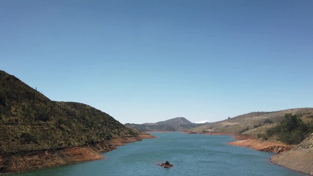 Tourist Looks Out Onto Upper Bhavani Lake In Nilgiri Biosphere Reserve Outside Ooty, Tamil Nadu, India.