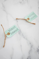 plant-based and animal-based labels on top of marble table, healthy nutrition and ethical choices