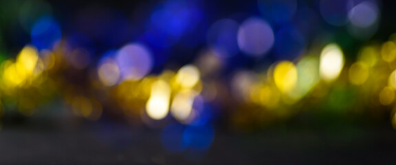 Abstract of bokeh blur banner background, green blue and gold color de focused