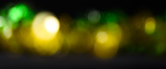 Abstract of bokeh blur banner background, green and gold color de focused