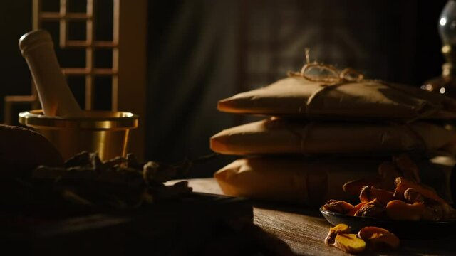 A closeup view of lighting and packs of medicine , herb and spices , chinese traditional medicine advertising