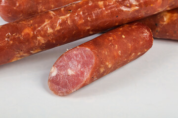 Pork ham sausage cut isolated