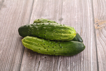 Fersh juicy green cucumbers heap