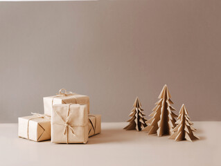 Christmas tree made of paper craft origami gifts packed in plain paper wooden star on a beige trendy background.