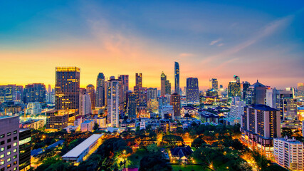 Bangkok buildings, Bangkok city downtown with sunset sky, Transaction beautiful road top view at night traffic