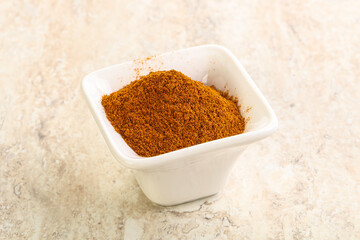 Dry Paprika powder in the bowl