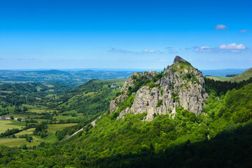 Fototapeta na wymiar Tuiliere rocks and mountains in Auvergne landscape