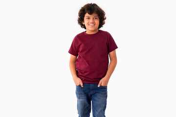 PORTRAIT OF A STYLISH BOY POSING IN FRONT OF CAMERA