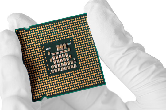 Hand With White Glove Holding CPU Or Microcomputer Isolated On White Background.