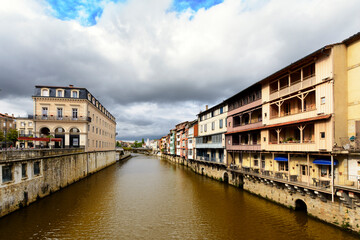 Fototapeta na wymiar Castres city and homes along the Agout river, France