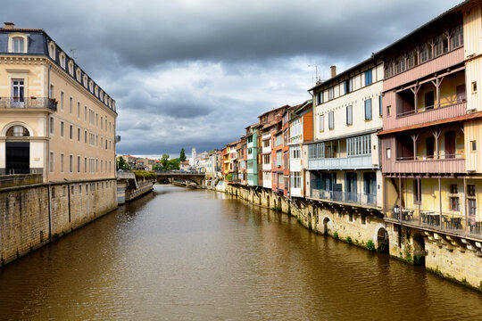 Castres city and homes along the Agout river, France