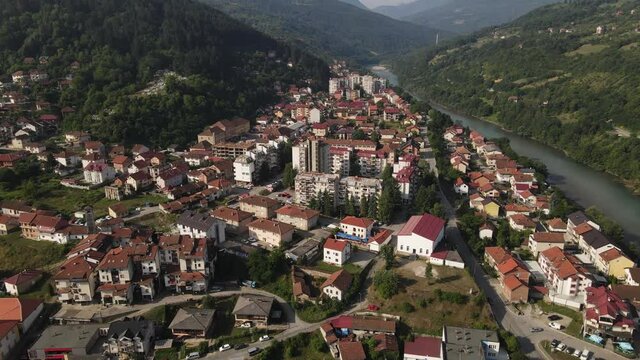 Aerial View of Foca, Bosnia Herzegovina, Cityscape and Buildings by Drina River on Sunny Summer Day