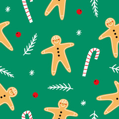 Christmas seamless pattern with gingerbread man and candy cane 