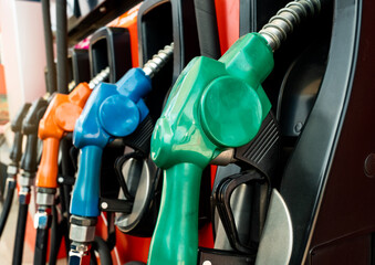 Petrol pump filling fuel nozzle in gas station. Fuel dispenser machine. Refuel fill up with petrol...