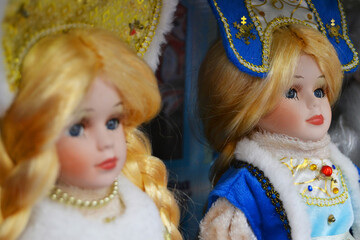 The tradition of Russian dolls in winter festive clothes