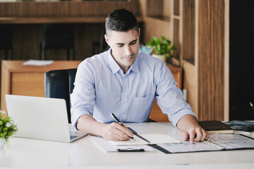 financial budget audit Auditors are reviewing financial statements to present to company owners...