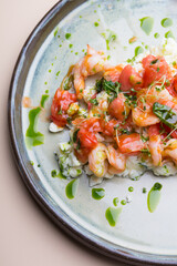 Egg and shrimp omelet served with tomatoes