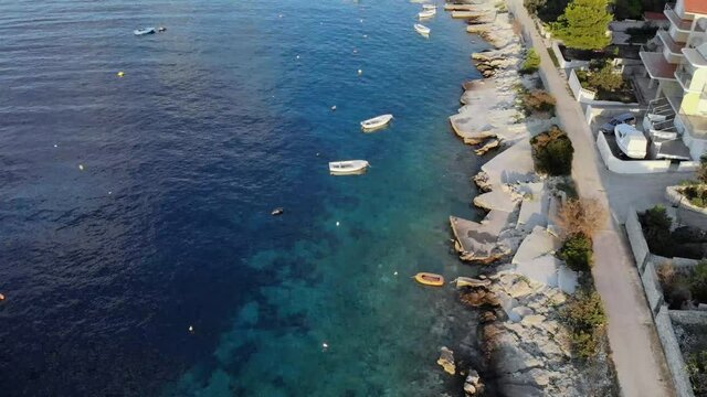 Aerial Sevid peninsula coast, forward tilt up.