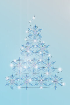 Vertical image of creative Christmas tree made of snowflakes, with painted garland on blue background. Concept of happy New year and Christmas. Ready-made postcard, invitation to holiday