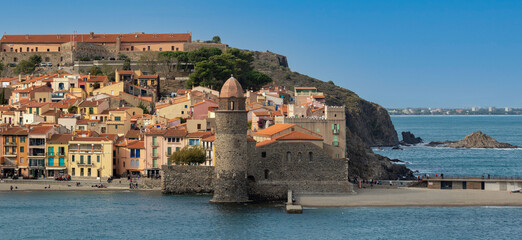 Fototapeta premium Old town of Collioure, France, a popular resort town on Mediterranean sea, view of the habor and church. High quality photo