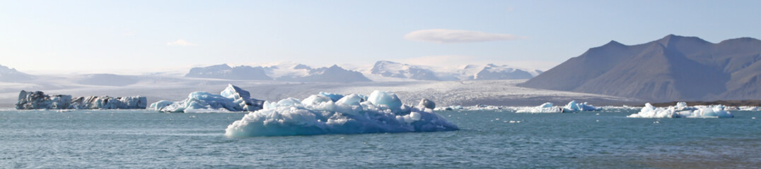 Fototapeta na wymiar Icebergs float on Jokulsarlon glacier lagoon - Iceland
