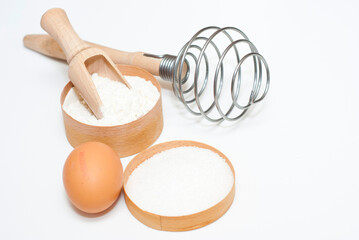 dough baking ingredients on white surface