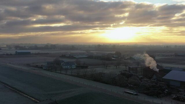 farmland Sunrise Drone shot with winter morning dew, Netherlands farmland