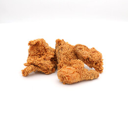 Fried and crispy chicken legs in a distinctive golden color