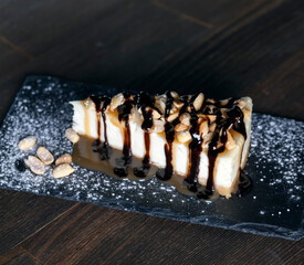 dessert cheesecake covered with caramel and chocolate