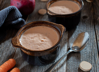 Skyr with blended carrots and apples in a bowl