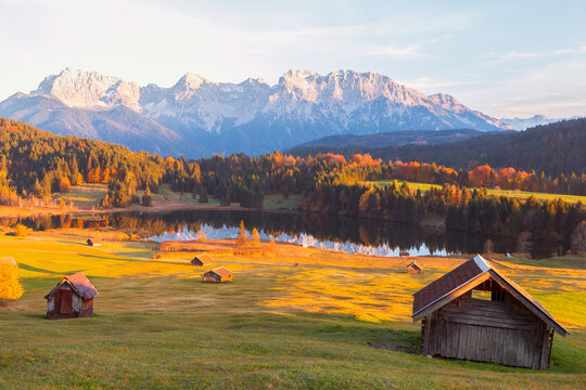 Amazing mountain pond on the Geroldsee lake (Wagenbr&uuml;chsee), in the background overlooking the Alpspitz and Zugspitz mountains at sunset, Garmisch-Partenkirchen, Bavaria