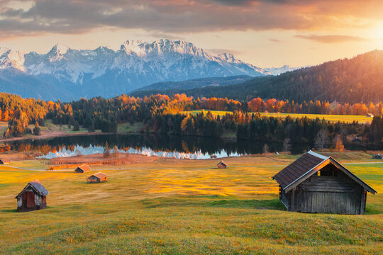 Amazing mountain pond on the Geroldsee lake (Wagenbr&uuml;chsee), in the background overlooking the Alpspitz and Zugspitz mountains at sunset, Garmisch-Partenkirchen, Bavaria