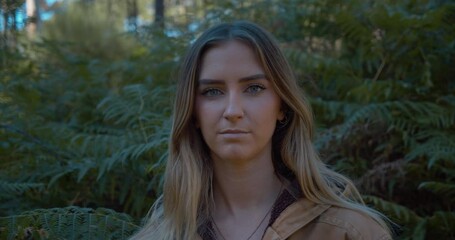 Traveler adventurer and expeditionist caucasian woman in the wild