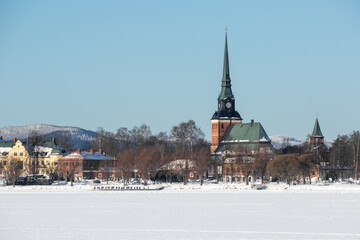 small town in winter in the snow, in Mora (Dalarna) Sweden - obrazy, fototapety, plakaty