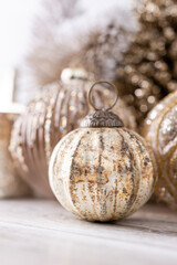 Golden christmas balls with bokeh background.